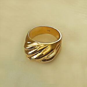 Fancy design puffed shrimp style 14karat yellow gold ring