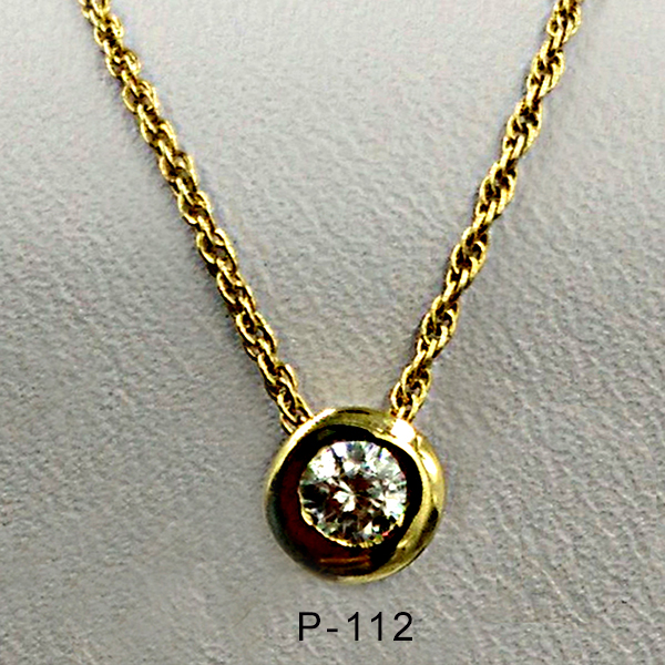 14Karat yellow gold bezel pendant