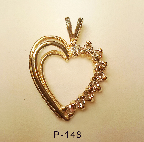 14Karat yellow gold heart shaped pendant with 0.35ct diamonds