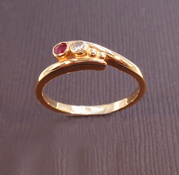 Hwy bezel set ruby and diamond ring