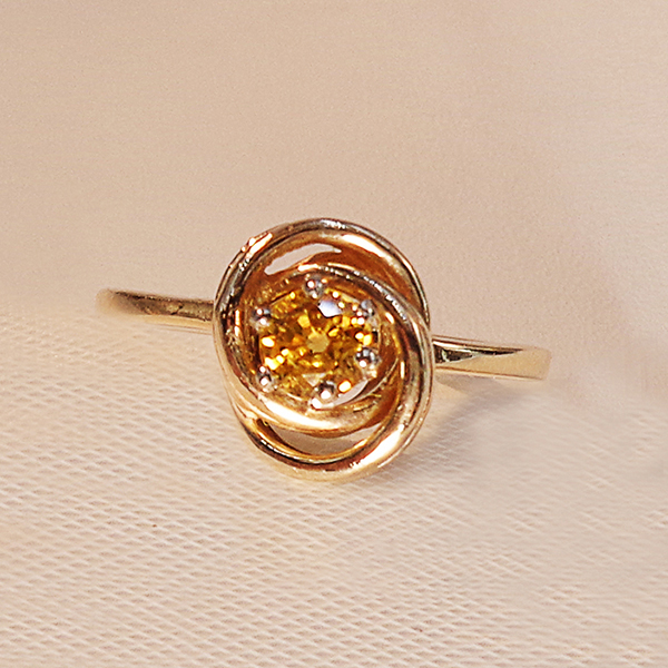 Yellow sapphire love knot ring